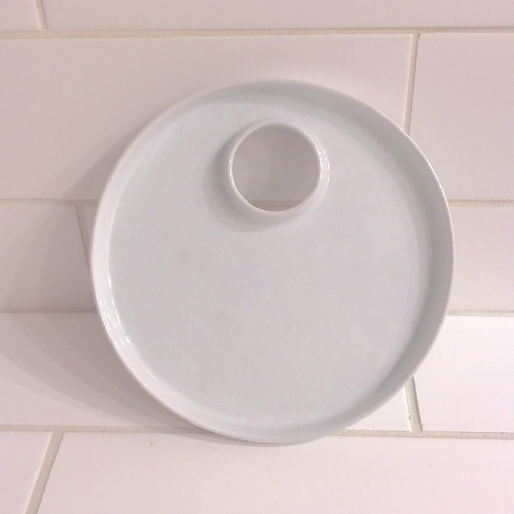 White ceramic display plate with hole